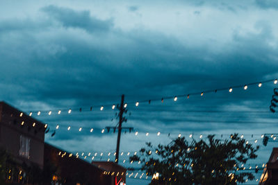 View of harbor against cloudy sky