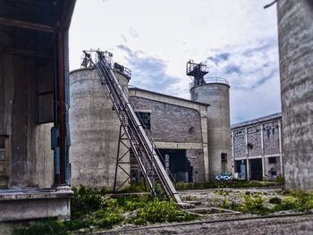 Low angle view of old building against sky