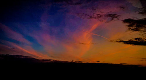 Scenic view of dramatic sky during sunset