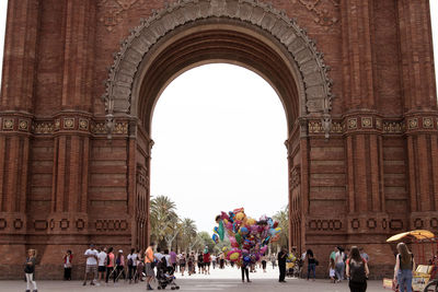 Group of people in front of historical building