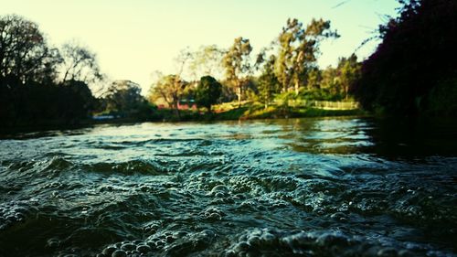 Scenic view of river against sky