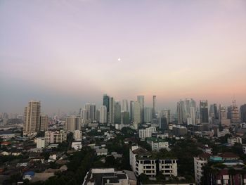 High angle view of buildings against sky during sunset