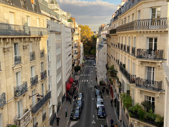 High angle view of street amidst buildings in city