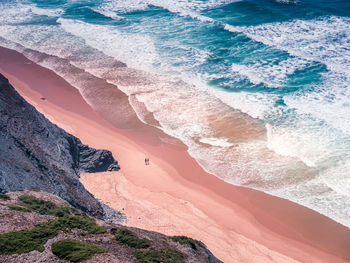 High angle view of rock formation in sea