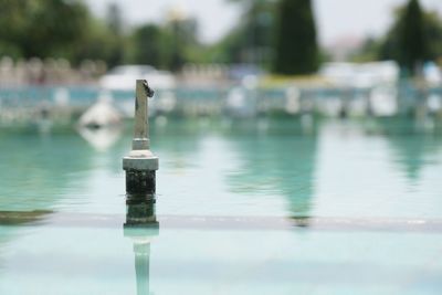 Close-up of water fountain in swimming pool