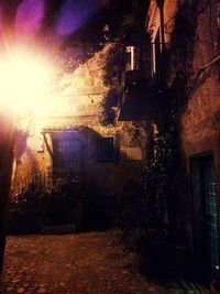 Buildings in city at night