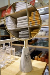 Close-up of mirror on table in store