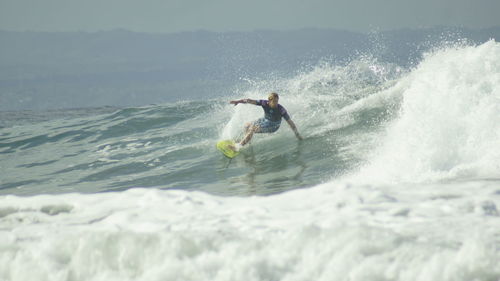 Man surfing in sea