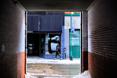 Man standing by window