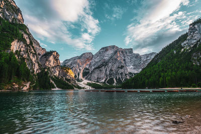 Scenic view of lake and mountains against sky