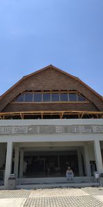 Low angle view of building against clear blue sky