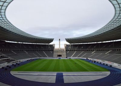 Low angle view of soccer field against sky