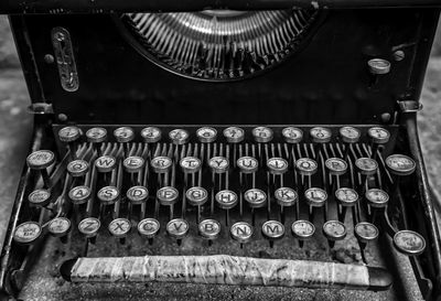 Close-up of old typewriter on table