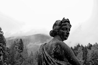Low angle view of statue against sky