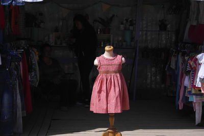 Rear view of boy in store