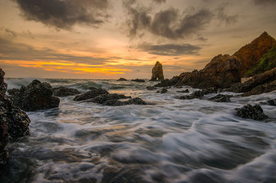 Scenic view of sea against sky during sunset