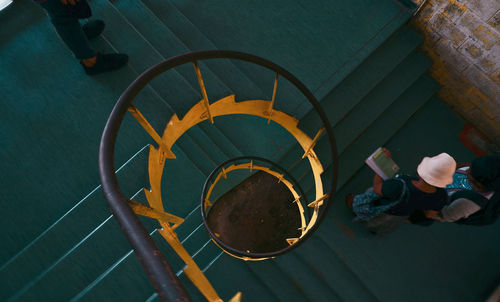 High angle view of man working on staircase in building