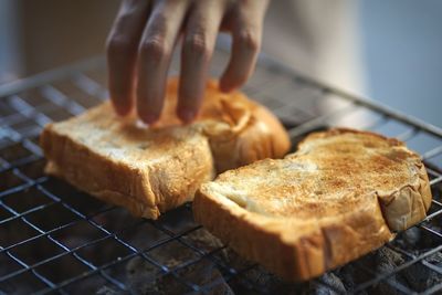 Close-up of person preparing food