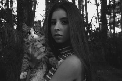 Portrait of young woman in a forest