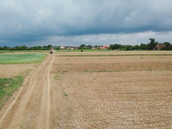 Scenic view of field against sky