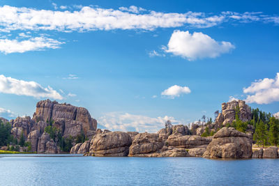 Scenic view of rocks on waterfront