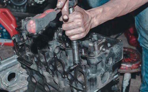 Cropped hands of man working in workshop