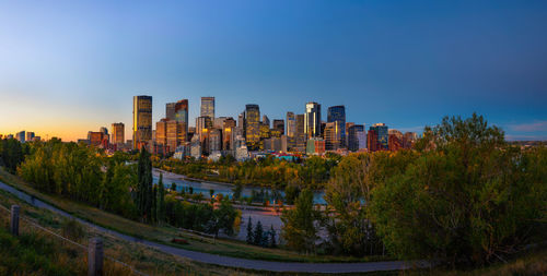 Buildings in city against sky