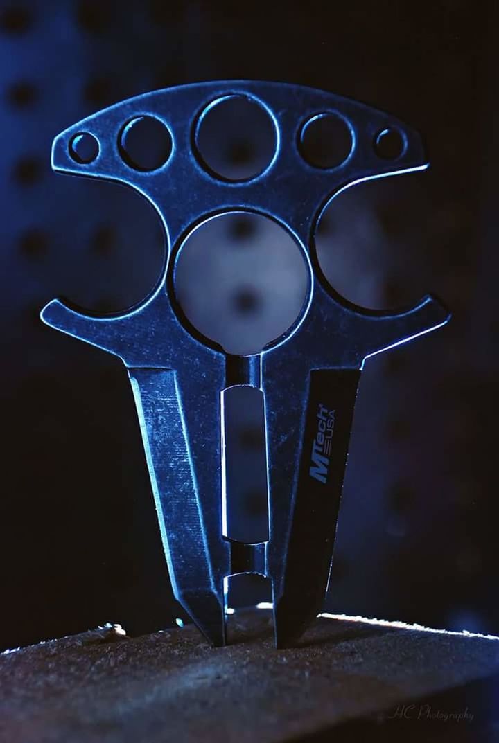 CLOSE UP OF BLUE KEYS WITH BLACK BACKGROUND