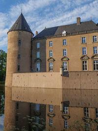 Low angle view of old building against sky