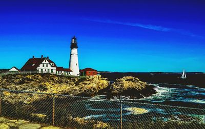 Lighthouse against blue sky