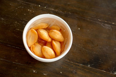 High angle view of fruits in bowl on table