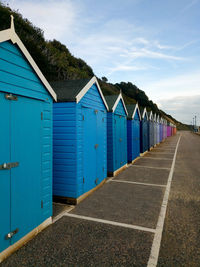 Rainbow-colored huts on mediterranean seafront promenade in bournemouth, england