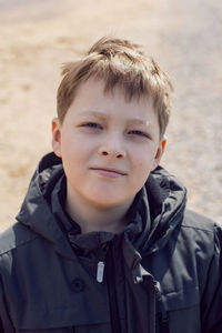 Portrait of young boy on nature