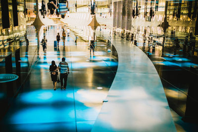 People walking in corridor