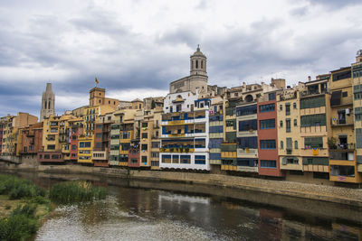 Buildings in city against sky