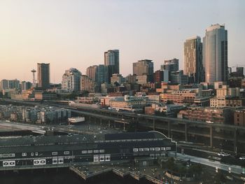 View of modern buildings in city against sky