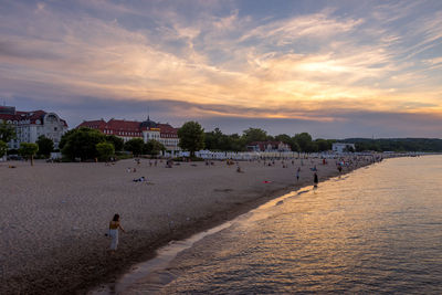 Scenic view of beach against sky during sunset