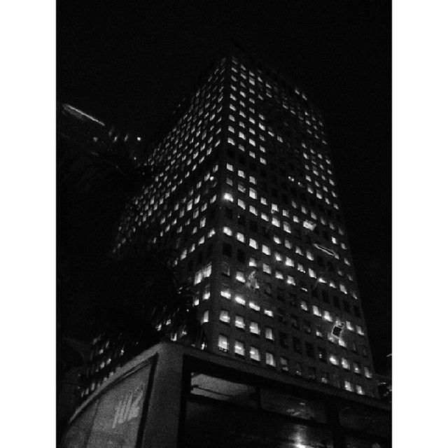 architecture, building exterior, built structure, transfer print, city, skyscraper, modern, office building, auto post production filter, low angle view, tall - high, night, tower, illuminated, building, clear sky, tall, sky, no people, glass - material