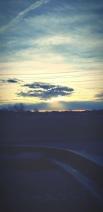 Scenic view of silhouette landscape against sky during sunset