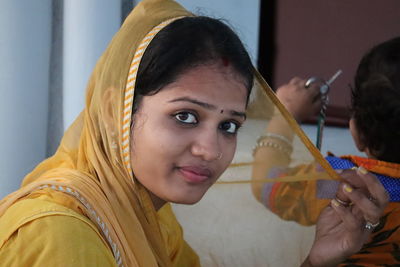 Portrait of smiling indian woman