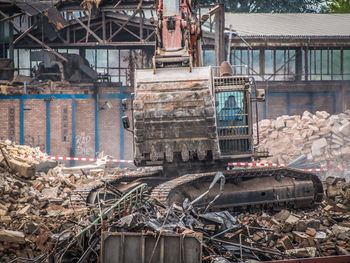 Abandoned shopping cart at construction site