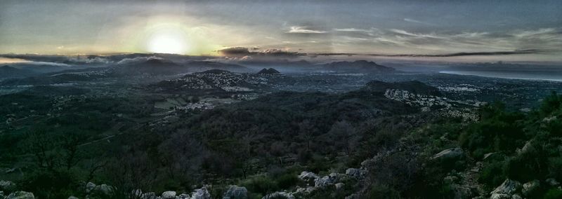 Panoramic view of landscape against sky during sunset