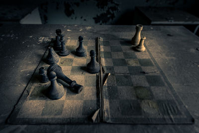 High angle view of chess pieces on floor