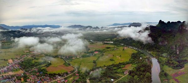 Panoramic view of golf course against sky