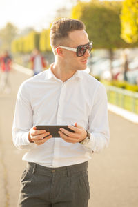 Young man using mobile phone