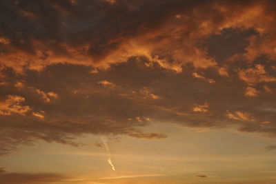 Low angle view of cloudy sky during sunset