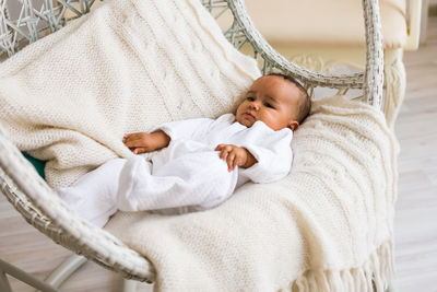 Cute baby sleeping on bed