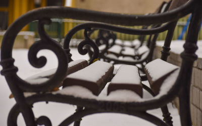 Close-up of metal railing on table