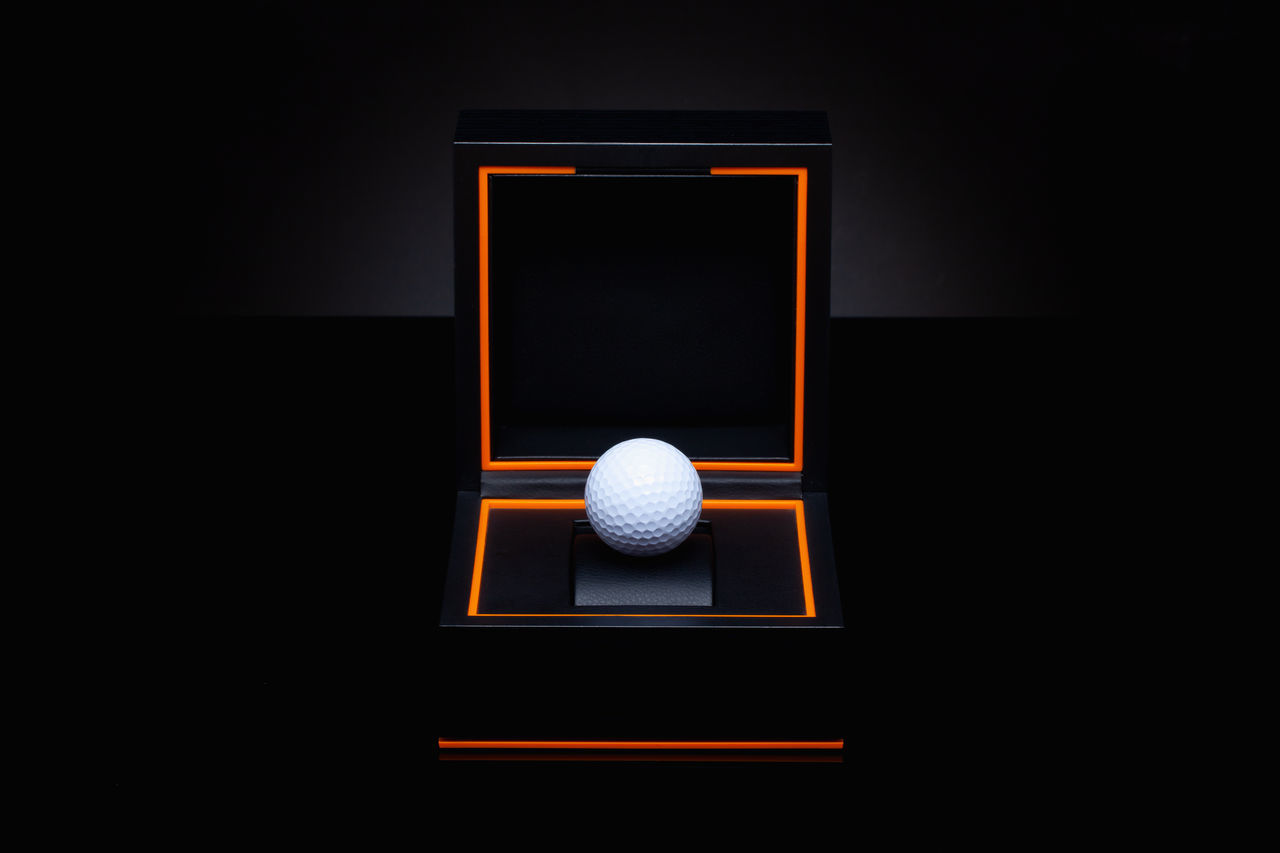 golf ball, ball, golf, sports, no people, black background, sphere, studio shot, copy space, indoors, sports equipment