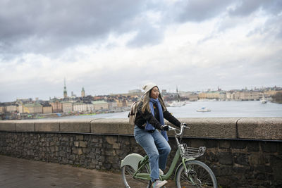 View of woman cycling